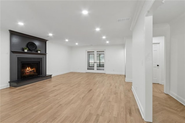 9165 Eves Cir, Roswell, GA 30076 - unfurnished living room with a fireplace, recessed lighting, light wood-style floors, and ornamental molding