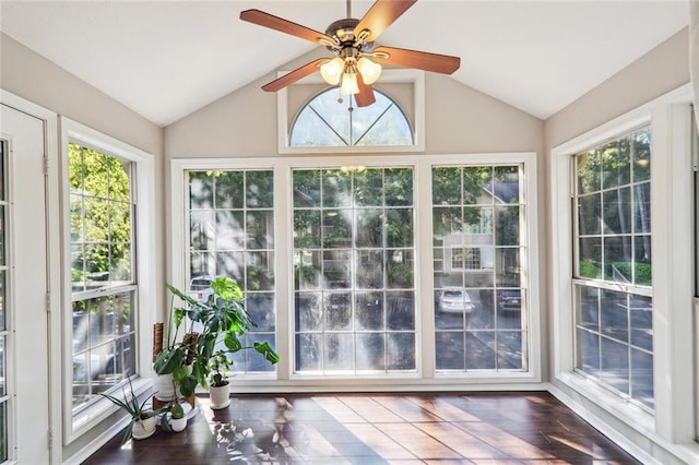 unfurnished sunroom with lofted ceiling and ceiling fan