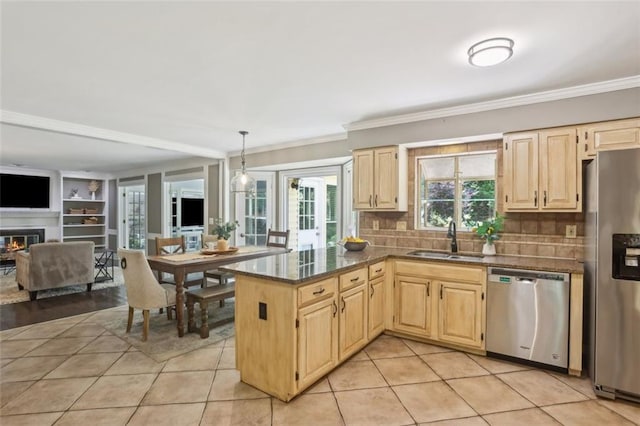 3837 Fenway Xing, Marietta, GA 30062 - kitchen with appliances with stainless steel finishes, a sink, light brown cabinets, and crown molding