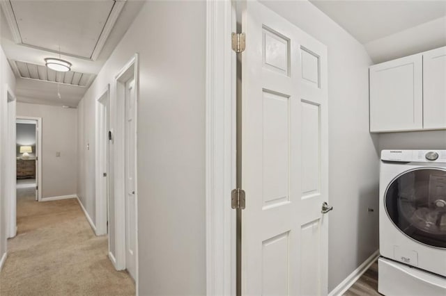 3837 Fenway Xing, Marietta, GA 30062 - laundry area featuring attic access, washer / dryer, cabinet space, baseboards, and light carpet