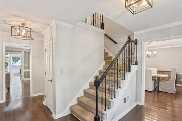 3837 Fenway Xing, Marietta, GA 30062 - staircase featuring a chandelier, crown molding, baseboards, and wood finished floors