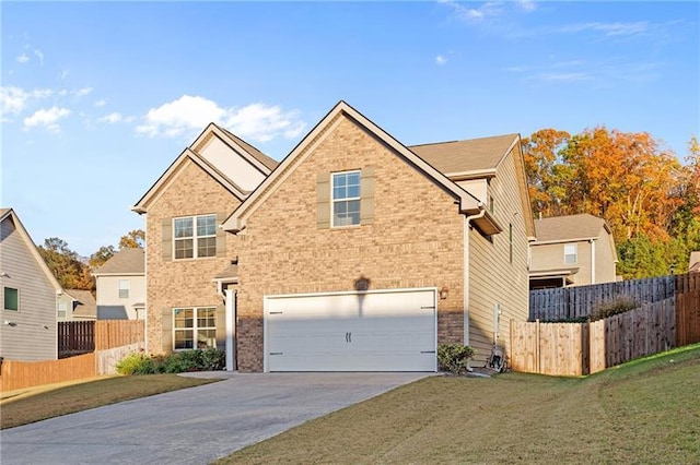 front facade featuring a front lawn and a garage