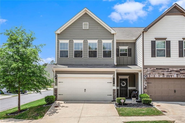 view of front of home with a garage