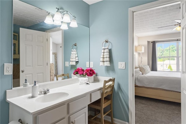 80 Riley Place Dr, Dawsonville, GA 30534 - bathroom with vanity, ensuite bathroom, a textured ceiling, and a ceiling fan