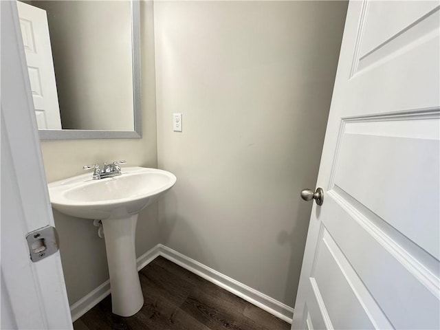 bathroom featuring wood-type flooring