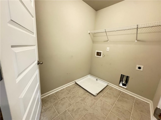 laundry area featuring tile patterned floors, hookup for a washing machine, and electric dryer hookup