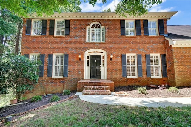 2935 Abbottswell Dr, Alpharetta, GA 30022 - view of front facade with brick siding and a front yard