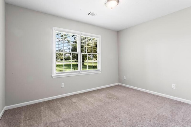 view of carpeted spare room