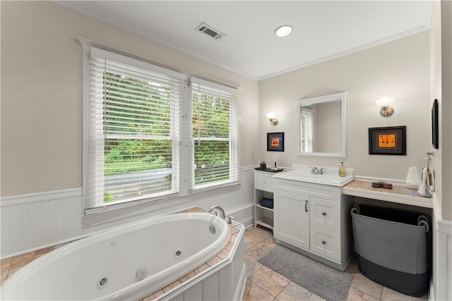 233 Spence Ave SE, Atlanta, GA 30317 - bathroom with vanity, a jetted tub, and crown molding