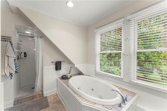 233 Spence Ave SE, Atlanta, GA 30317 - full bathroom with healthy amount of natural light, a stall shower, a jetted tub, ornamental molding, and a wainscoted wall