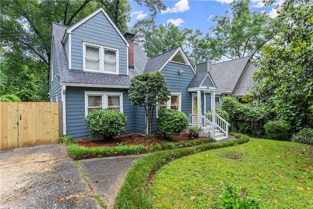 233 Spence Ave SE, Atlanta, GA 30317 - view of front of property featuring roof with shingles and a chimney