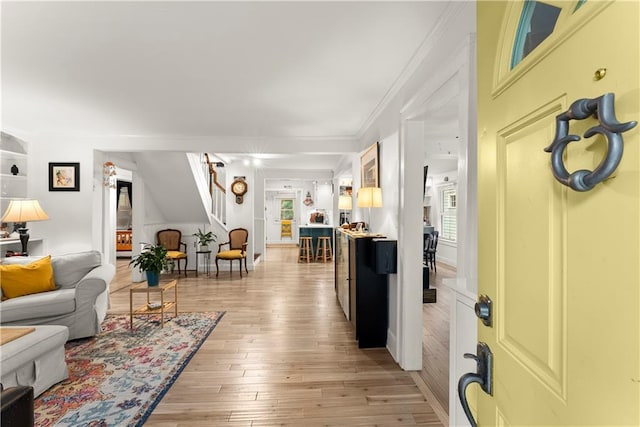 233 Spence Ave SE, Atlanta, GA 30317 - living area featuring light wood-style floors and crown molding