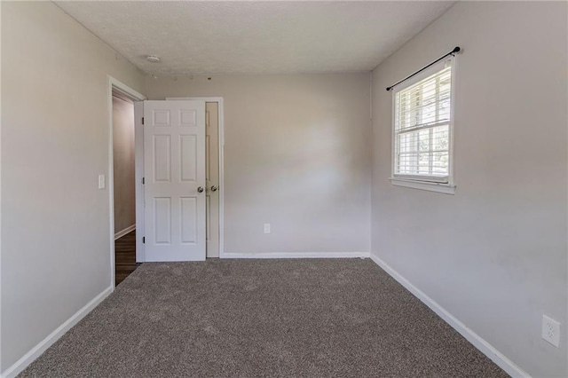 spare room with carpet flooring