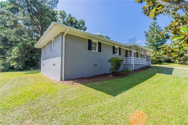 view of home's exterior featuring a lawn