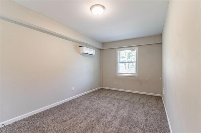 carpeted empty room featuring an AC wall unit