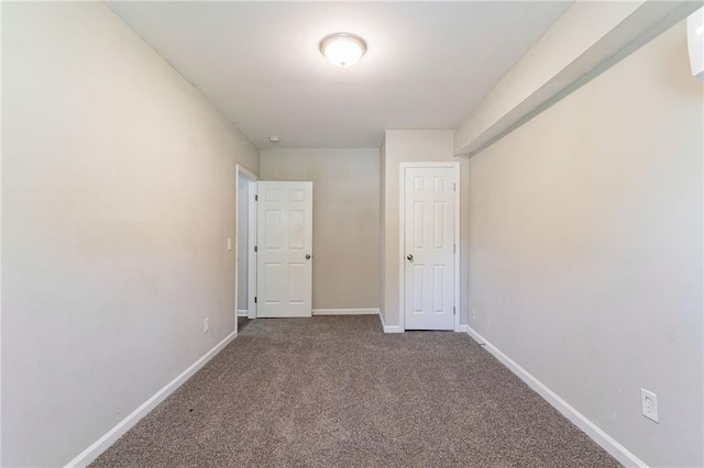 unfurnished bedroom featuring carpet floors