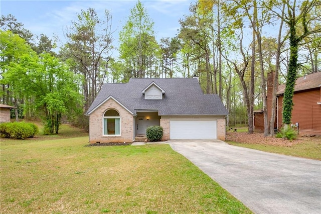 7275 Oswego Trl, Riverdale, GA 30296 - view of front of property with a front lawn, brick siding, an attached garage, a shingled roof, and concrete driveway