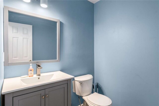 7275 Oswego Trl, Riverdale, GA 30296 - bathroom featuring toilet and vanity
