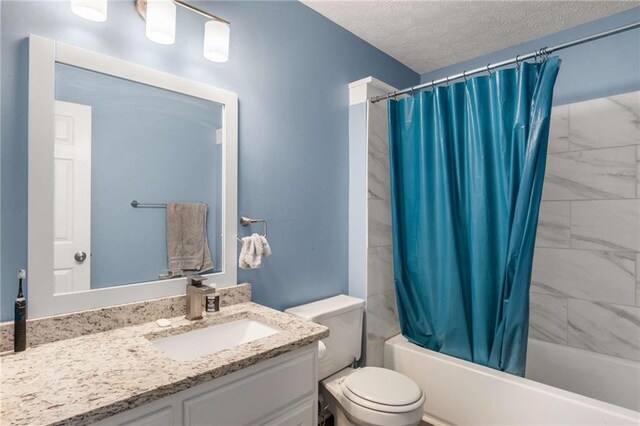 7275 Oswego Trl, Riverdale, GA 30296 - bathroom with shower / tub combo, vanity, a textured ceiling, and toilet