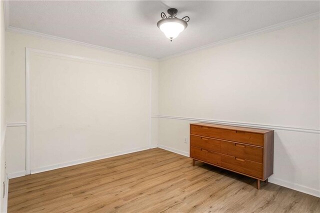 7275 Oswego Trl, Riverdale, GA 30296 - unfurnished room with baseboards, crown molding, and wood finished floors