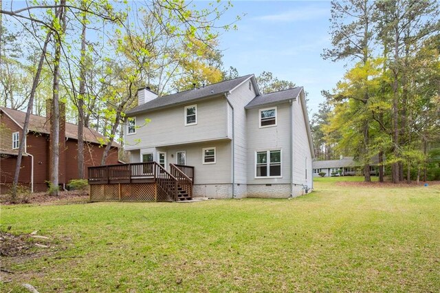 7275 Oswego Trl, Riverdale, GA 30296 - back of house with a yard, crawl space, a wooden deck, and a chimney