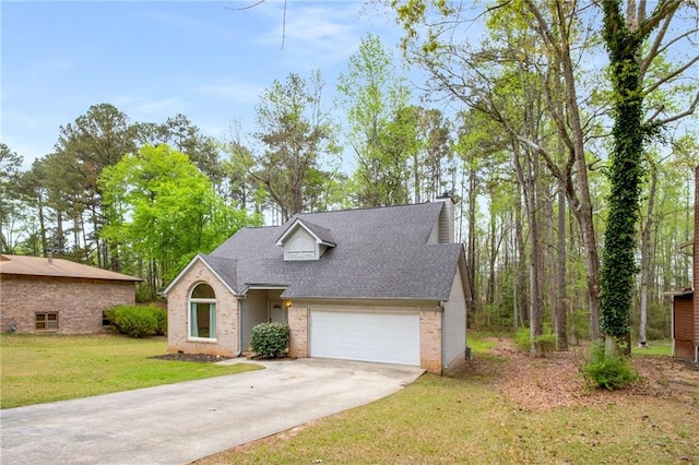 7275 Oswego Trl, Riverdale, GA 30296 - view of front of house with a front yard, brick siding, driveway, and a shingled roof