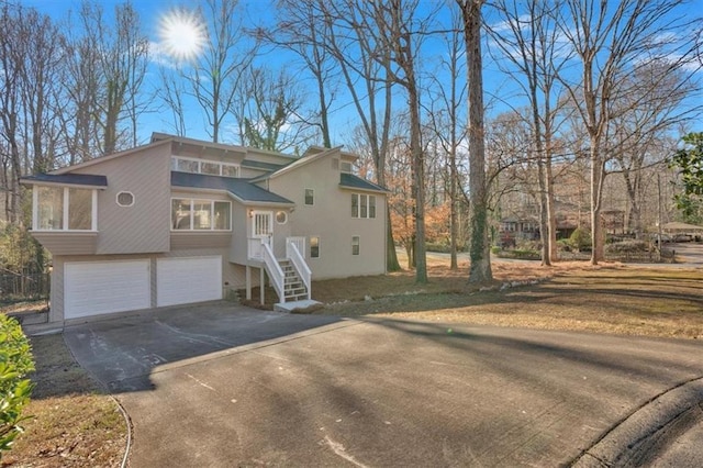 view of front of home with a garage