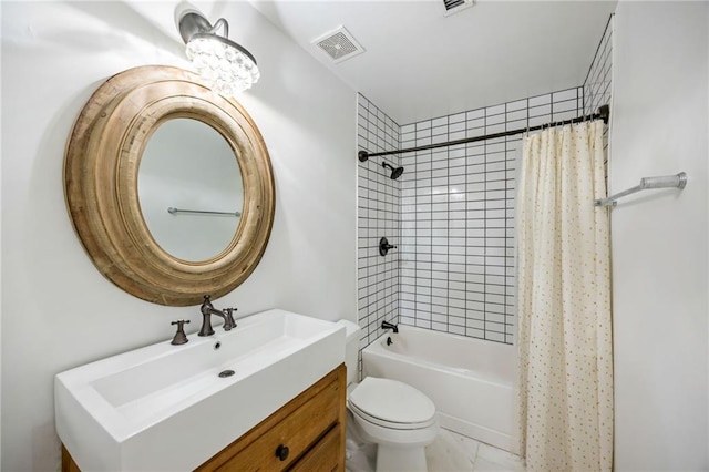 3235 Roswell Rd NE Unit 521, Atlanta, GA 30305 - bathroom with toilet, shower / tub combo, and vanity