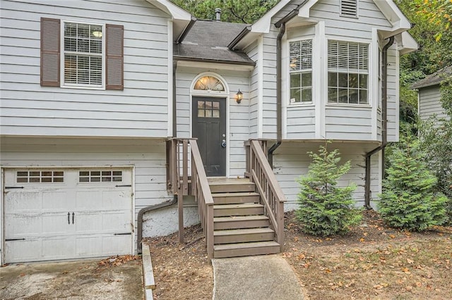 property entrance with a garage