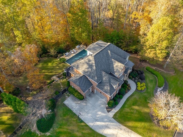 aerial view with a wooded view