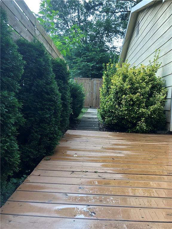 wooden deck featuring fence