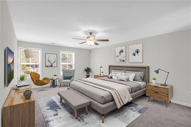 bedroom featuring ceiling fan and carpet floors