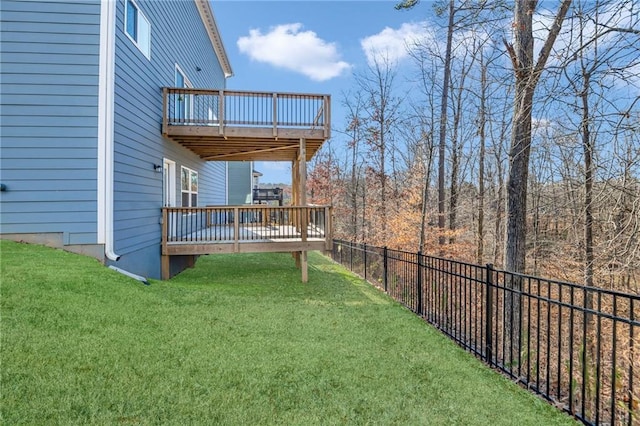 view of yard with a deck