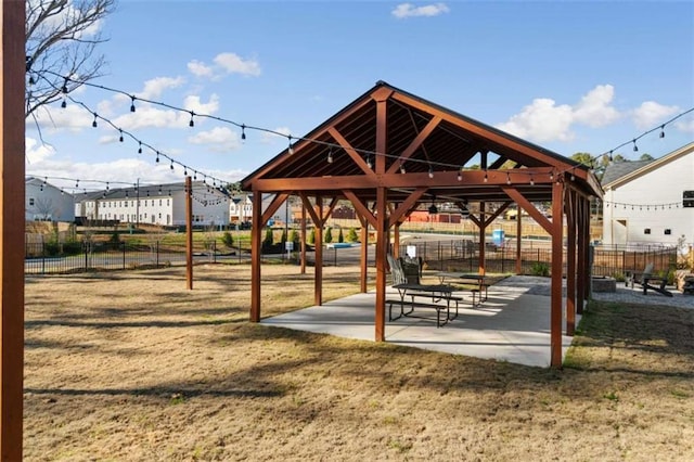 surrounding community featuring a yard, a gazebo, and a patio