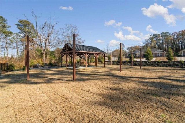 view of home's community featuring a gazebo and a yard