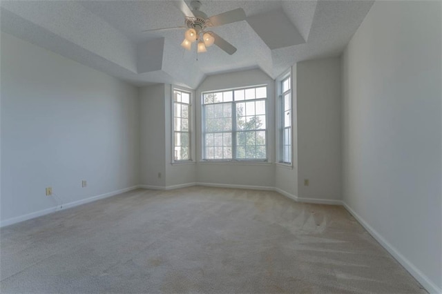 1015 Mcgill Park Ave NE, Atlanta, GA 30312 - carpeted spare room with a ceiling fan, baseboards, a textured ceiling, and vaulted ceiling