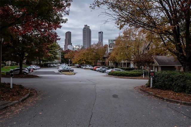 1015 Mcgill Park Ave NE, Atlanta, GA 30312 - view of asphalt road with curbs and a skyline view