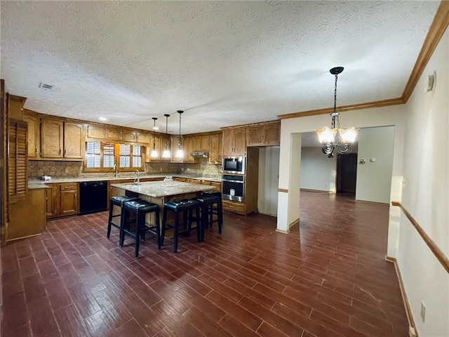 kitchen featuring black dishwasher, brown cabinetry, stainless steel oven, and built in microwave