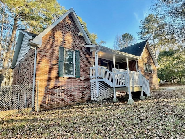 view of front facade featuring brick siding