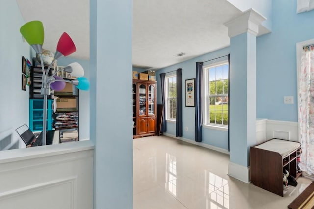 570 White Stag Ct, Suwanee, GA 30024 - hallway featuring tile patterned flooring and ornate columns