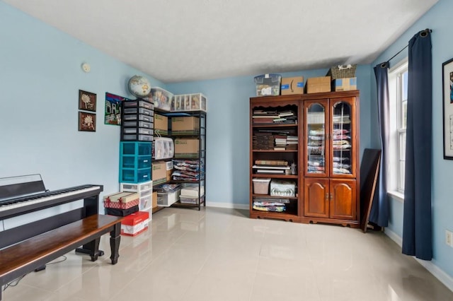 570 White Stag Ct, Suwanee, GA 30024 - living area featuring baseboards and tile patterned floors