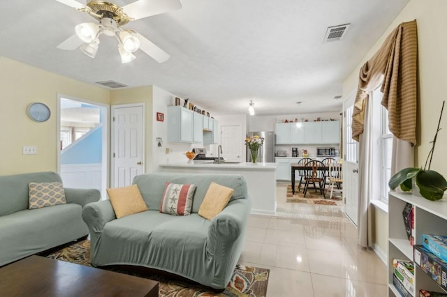 570 White Stag Ct, Suwanee, GA 30024 - living area with ceiling fan and light tile patterned floors