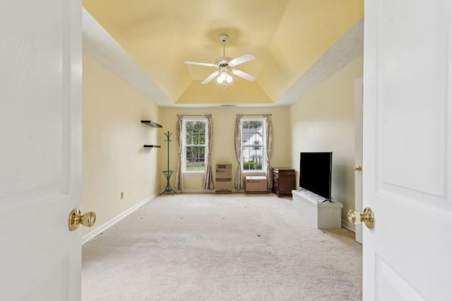 570 White Stag Ct, Suwanee, GA 30024 - unfurnished living room with a ceiling fan, a tray ceiling, carpet, and baseboards
