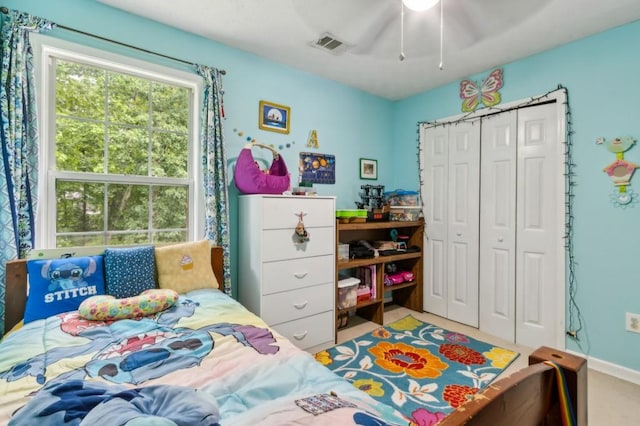 570 White Stag Ct, Suwanee, GA 30024 - bedroom with a closet, a ceiling fan, and carpet floors
