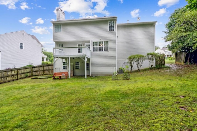 570 White Stag Ct, Suwanee, GA 30024 - rear view of house with a chimney
