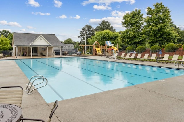 570 White Stag Ct, Suwanee, GA 30024 - community pool featuring a patio