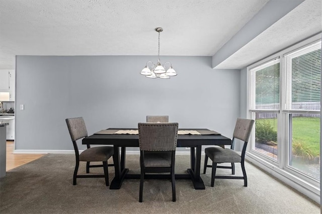 2711 Bluffton Rd, Buford, GA 30519 - dining room featuring a chandelier, light colored carpet, and a textured ceiling
