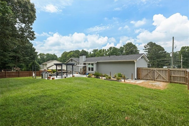 2711 Bluffton Rd, Buford, GA 30519 - back of property with a patio area, a fenced backyard, and a gate