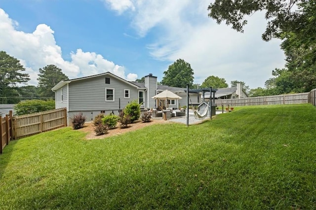 2711 Bluffton Rd, Buford, GA 30519 - rear view of property featuring a fenced backyard and a patio