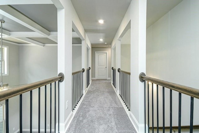 hallway featuring recessed lighting, carpet floors, and beamed ceiling
